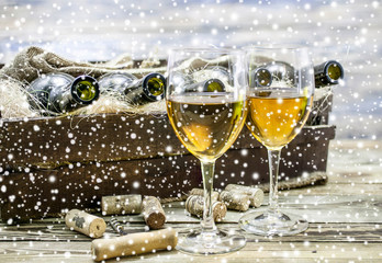 Two white wine  glasses.  New Year celebration background. 