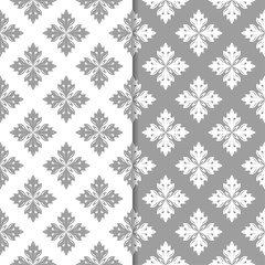 White and gray floral ornaments. Set of seamless backgrounds