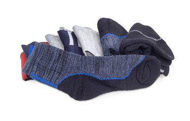 Men's thermal sock against of pile of other socks