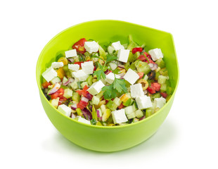 Greek salad in round green food container