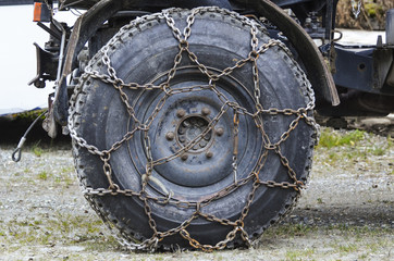 a truck wheel with strong chains for traction