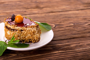 Sweet cake with mint leaves. Birthday dessert.