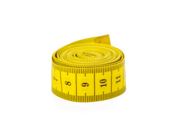 yellow metric measuring tape isolated on white panorama background