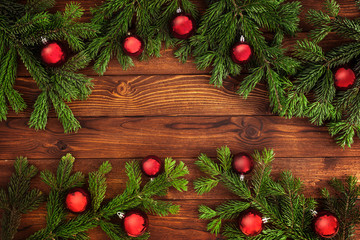 Naklejka na ściany i meble Christmas fir tree with decoration on a wooden board
