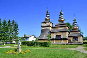 Fototapeta na wymiar Ancient greek catholic wooden church in Krempna, Beskid Niski, Poland