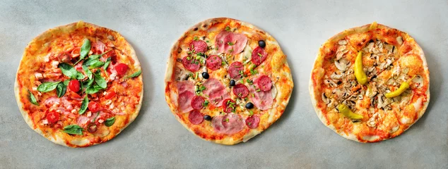 Foto op Canvas Pizza pattern. Three pieces set on grey concrete background. Top view, copyspace © jchizhe