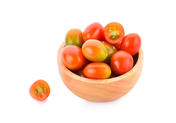 Small tomatoes isolated on white background.