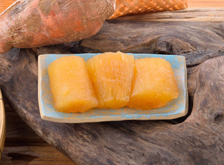 Cassava on a wooden background