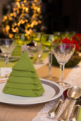 Blurred christmas tree and dinner table