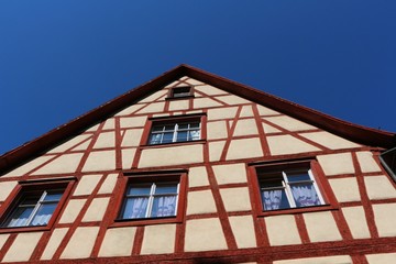 Top of a half-timbered house against blue sky (Meersburg, Lake Constance, Germany)