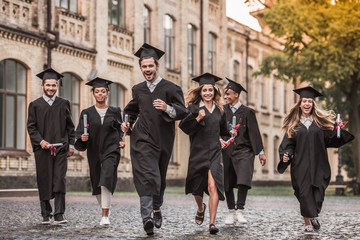 Happy young alumni