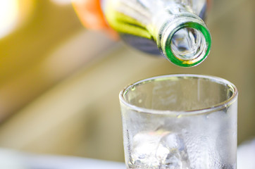 Cola drop in glass on holliday time