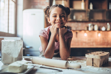 Cute girl on kitchen