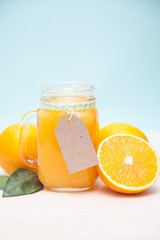 Fototapeta na wymiar Fresh orange juice in a jar