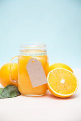 Fototapeta na wymiar Fresh orange juice in a jar
