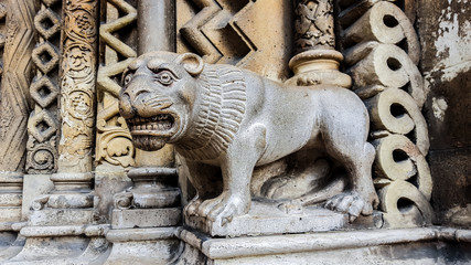 Statue of lion on the portal of Jak Chapel  in Vajdahunyad Castle. Budapest, Hungary.  © sforzza