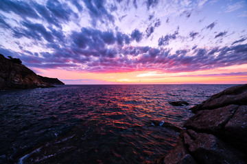 Scenic coastal sunset on island of Elba in Tuscany