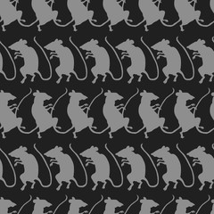 Rat silhouettes on black background. Seamless pattern.