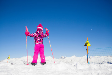 little girl  at the ski resort