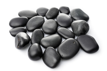 Massage stones on white. Black Stones isolated