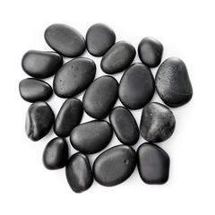 Massage stones on white. Black Stones isolated