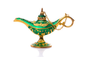 Fototapeta na wymiar Vintage lamp of Aladdin. Old style oil lamp. Ancient lamp. Genie lamp also called Aladdin lamp with pharaonic symbols