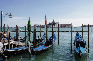 Fototapeta na wymiar gondolas moored in Venice on the Canal Grande