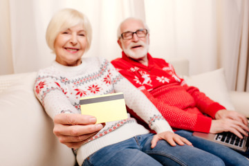 senior couple with credit card