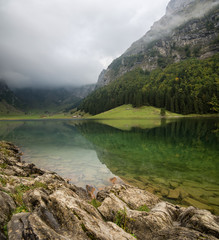 Lake in the mountain valley in the Switzerland. Beautiful natural landscape in the Switzerland mountains.