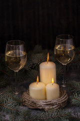 Candles and two glasses wine