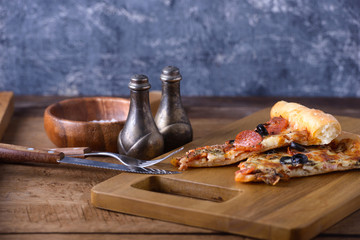 Pizza on wooden board