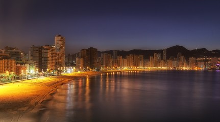 Editorial Benidorm, Spain - October 9, 2017: Peaceful and tranquil morning on Levante Beach until the masses of tourists fill the pristine sandy bay at the popular Spanish holiday resort of Benidorm