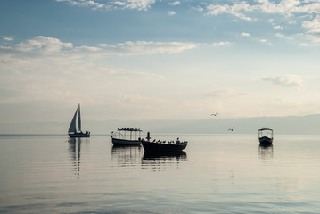Boats sailing in calm Lake Ohrid, Macedonia