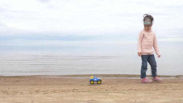 sand therapy. the child plays with the sand. Toys in the sand of the sea
