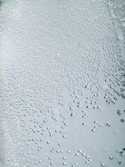 Bubbles in water, rain drops on glass, abstract background