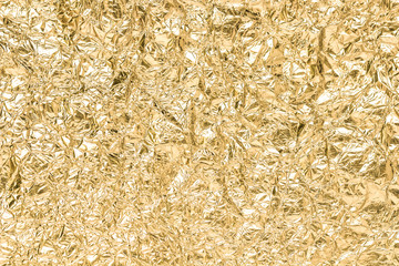 Gold wrinkled paper texture abstract background
