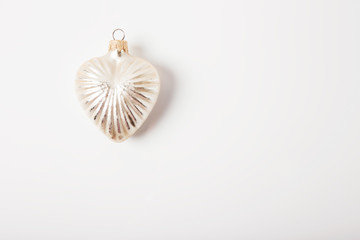 Christmas tree silver toy.White background.Top view.Flat lay.Minimalist style.