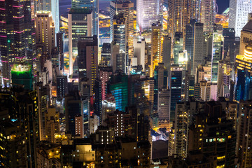 Naklejka premium Hong Kong skyline cityscape, modern skyscraper building, view from the Peak at twilight dusk