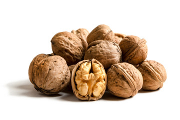 A handful of walnuts isolated on a white background