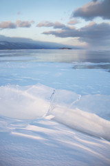 ice floes in snow on Lake Baikal. Winter landscape