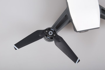 Remote Control Air Drone with action camera detail isolated on grey