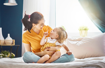 Mom and daughter are playing