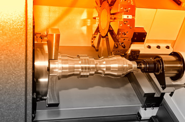 Metal detail on the industrial lathe. Red toning.