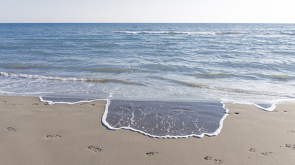 horizon and sea and footprints