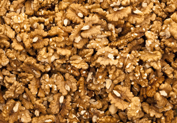 Obraz na płótnie Canvas Background of walnuts close up