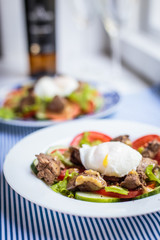 Salad with poached egg