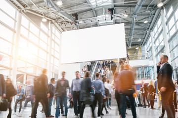 crowd of anonymous business people at a trade fair 