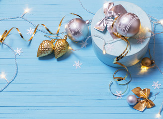 Christmas decorations on blue wooden background