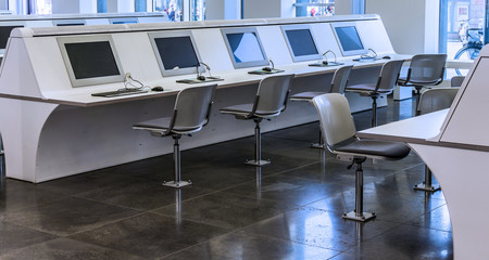 Computer workstations for students in the main building of a university, Germany