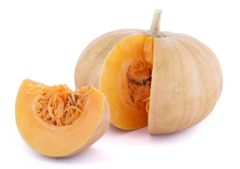 Pumpkin with a slice on white background
